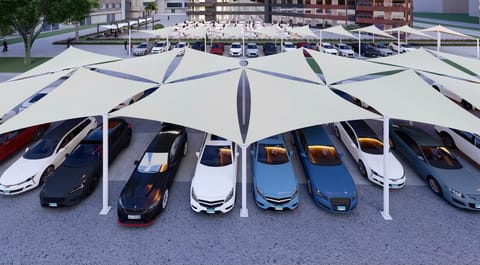 Rows of white hypar car parking shades covering parked cars